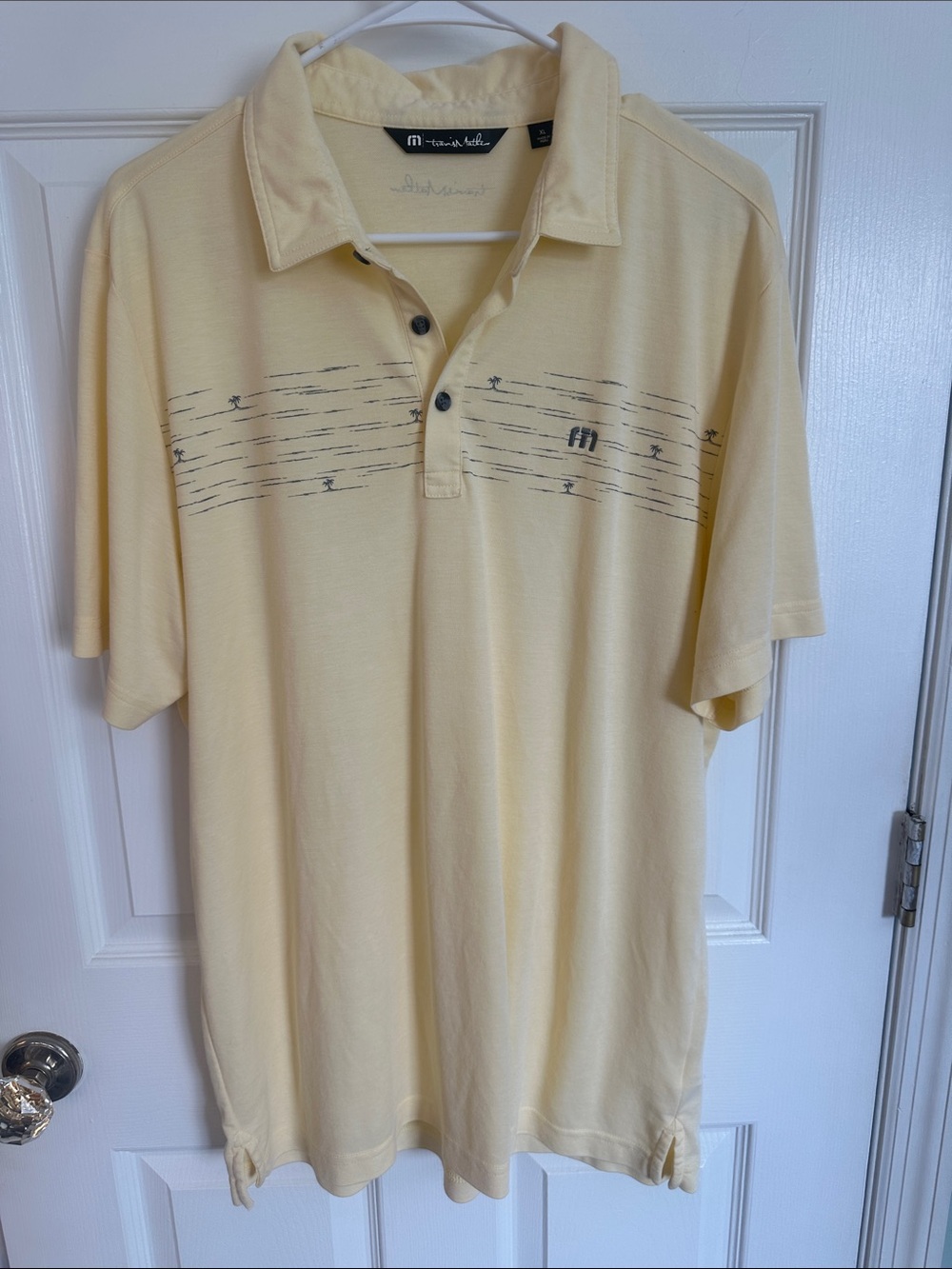 Travis Matthew’s Collection Pale Yellow Short-Sleeve Polo with Subtle Stripe